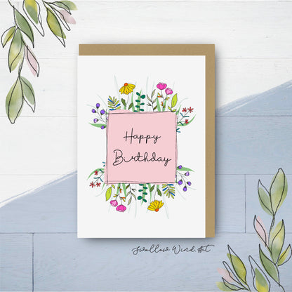 Greeting card with illustration of a pink square frame surrounded by colourful flowers. In the middle of the square has the words "Happy Birthday"